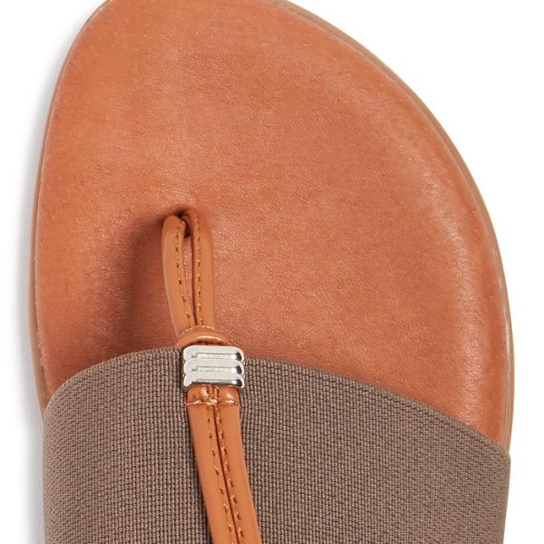 Andre Assous Nice Taupe thong style sandal with leather padded footbed and wide elastic band| Ooh! Ooh! Shoes woman's clothing and shoe boutique naples and mashpee